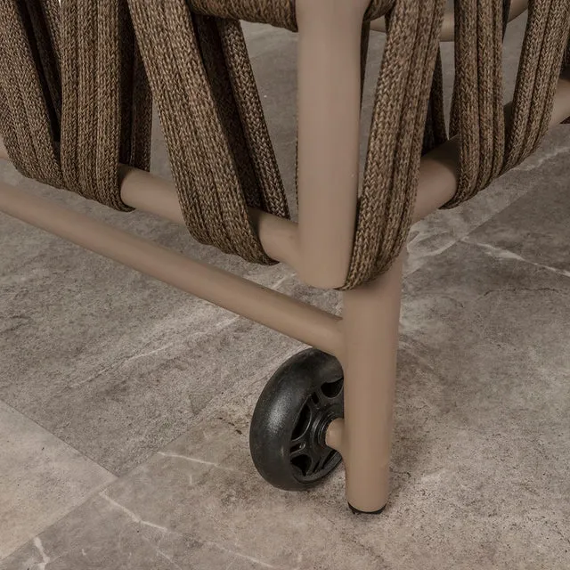 Close view of the lounger wheel, frame, and brown rope detail